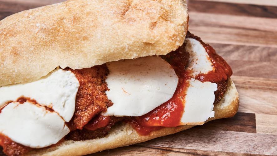 Chicken Parm · Breaded chicken cutlet with fresh Mozzarella cheese and. homemade Parmesan sauce.