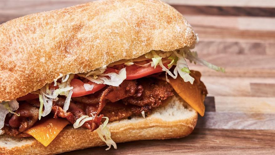 Chicken Cheddar Bacon Sandwich · Breaded chicken cutlet, melted Cheddar cheese, crispy bacon,. lettuce and tomato.