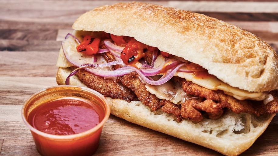 Fire Island · Breaded chicken cutlet, Jalapeno Jack cheese, roasted red. pepper, grilled onions and chipotle sauce.