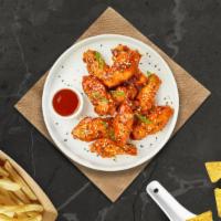Orient'S Origin Wings · Fresh chicken wings breaded, fried until golden brown, and tossed in sweet and sour sauce. S...