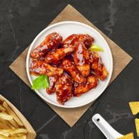 Sunday Bbq Wings · Fresh chicken wings breaded, fried until golden brown, and tossed in barbecue sauce. Served ...