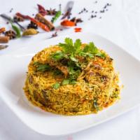 Cotillion Special Biryani · Seasoned basmati rice with chicken lamb and shrimp.
