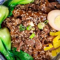 Marinated Beef Rice Bowl 牛肉饭. · Japanese Style Marinated Sliced Beef with Onion, Braised Egg, Vegetables.