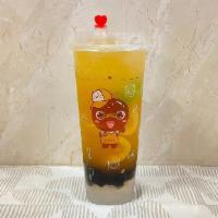Passion Mix · Passion fruit, spring tea, lychee jelly and boba.