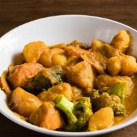 Malaysian Curry Stew · With soy protein, broccoli, carrots and potatoes.