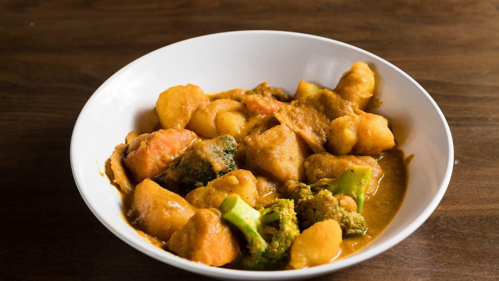Malaysian Curry Stew · Spicy. With soy protein, carrot, broccoli, potatoes, and miso soup.