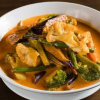 Red Curry Seitan · Spicy. Seitan with eggplant, broccoli, cauliflower and bell pepper with coconut milk, and mi...