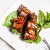 Seitan Skewers · with mixed salad.