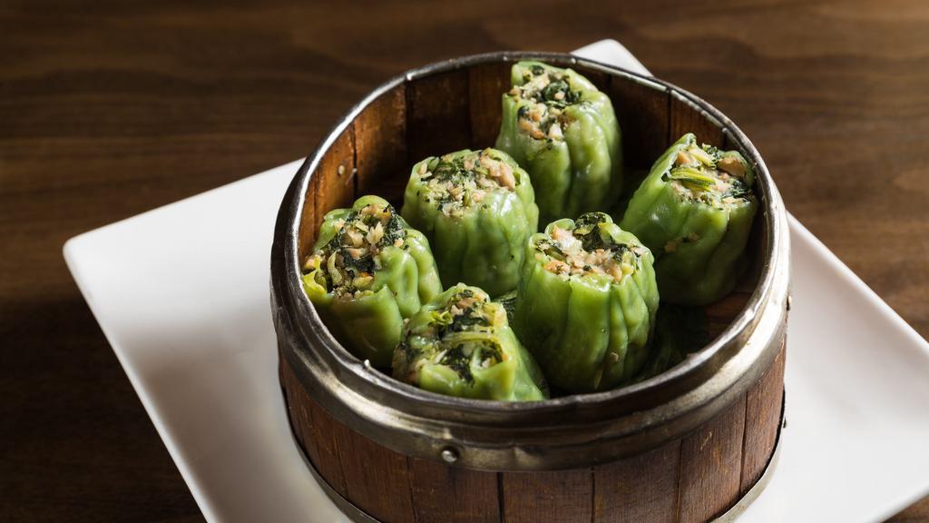 Steamed Spinach Shumai · With vinaigrette soy sauce.