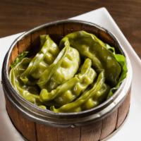 Steamed Or Pan-Fried Vegetable Dumplings · With vinaigrette soy sauce.