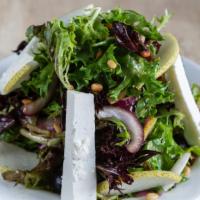 Pear Salad · Microgreens, red onion, black olives, pignoli nuts and cheese.