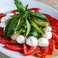 Fresh Mozzarella, Tomato & Basil Salad · 