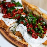 Chicken Cutlet · With fresh mozzarella and sun-dried tomatoes.