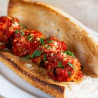 Meatball · With tomato sauce.