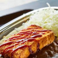 Tofu Katsu Curry · Panko-breaded fried tofu drizzled with tonkatsu sauce, served with Japanese homemade curry o...