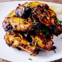 Original Tandoori Wings 🌶 · Chef special recipe tandoor baked (Clay oven) over high flame lightly charred wings.