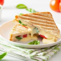 Fresh Mozzarella Sandwich · Fresh mozzarella with spinach, juicy tomato, creamy avocado and chipotle on sliced bread or ...
