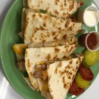 Chicken Quesadillas · With peppers and onions.
