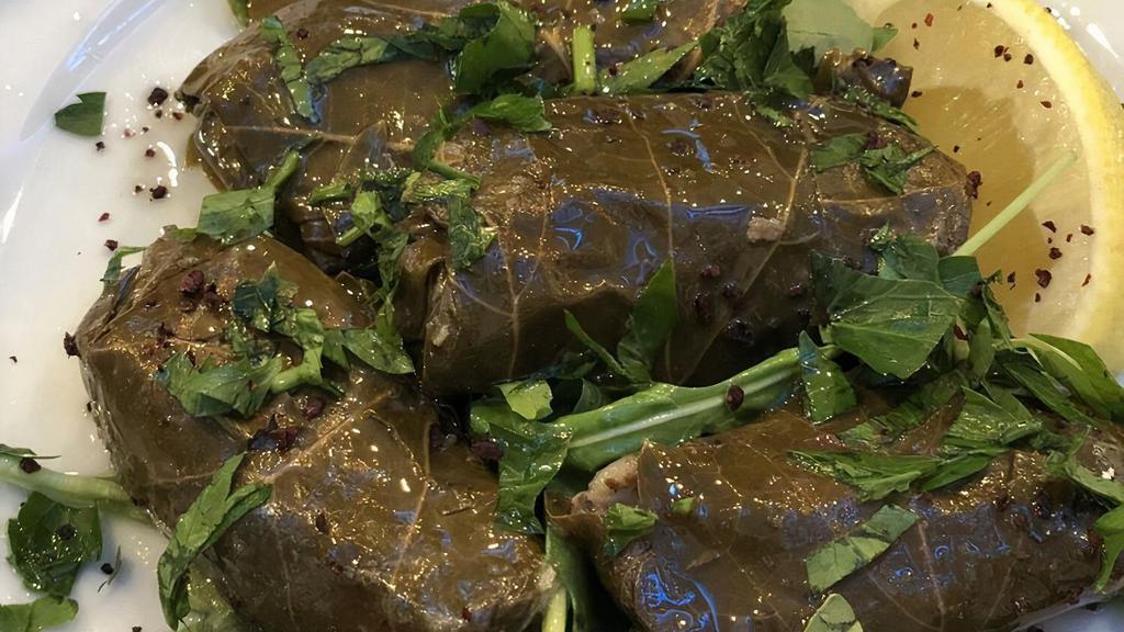 Stuffed Grape Leaves · Grape leaves stuffed with special seasoned rice and pine nut with olive oil.