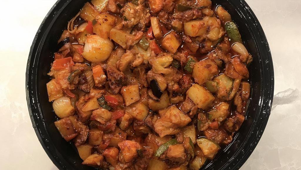 Sauteed Mixed Vegetable · A fine mixture of potatoes, carrots, zucchini, eggplant, white onion, red/green peppers, garlic sauteed with our light tomato sauce. Served with rice.