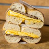 Sausage, Egg And Cheese Bagel · Choice of bagel with sausage, 2 scrambled eggs, and cheese.