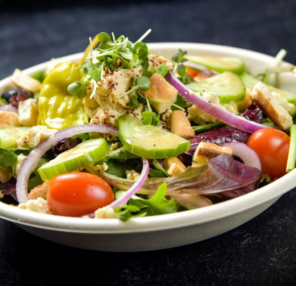 Greek Salad Bowl · Lettuce, tofu feta, olives, cucumber, tomato, red onion, pepperoncini and red wine vinaigrette.