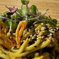 Cold Peanut Noodles · Spinach noodle tossed with peanut sauce, scallions and sesame seeds.