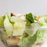Classic Caesar Salad · Romaine lettuce, shaved and grated Parmesan cheese, croutons, Caesar dressing.