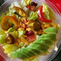 Chipotle Salad · Romaine lettuce, Cheddar cheese, avocado, beans, red onions, tomatoes, cherry jalapeños, chi...