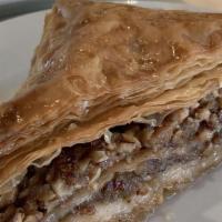 Baklava · Prepared with a mixture of nuts, spices and syrup baked in phyllo.