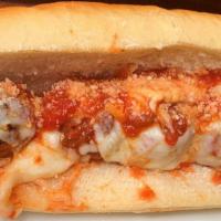 Meatball Parm Sandwich · Homemade Meatballs topped w/ Fresh Mozzarella & Marinara  served on Calandra's Sub Roll