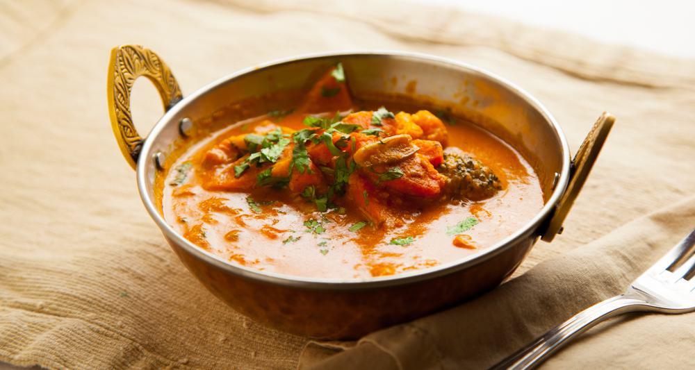Indian Vegetable Curry · Mixed vegetables slow cooked and simmered in special sauce and spices.