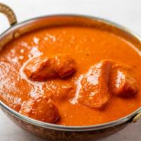 Chicken Tikka Masala · Our signature dish of char-grilled chicken in a flavorful creamy tomato sauce.