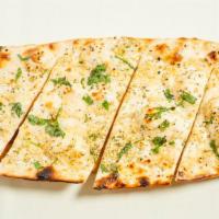 Garlic Naan · Healthy unleavened bread stuffed with fresh garlic.