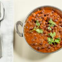 Chana Masala ( Vegan ) · Chick peas cooked with onions ,tomatoes and herbs.