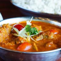 Lamb Vindaloo · Spiced lamb cooked in a very spicy sauce.