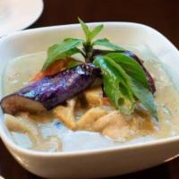 Veg Green Curry · Coconut milk, bamboo shoot, bell pepper, eggplant, and basil. Spicy.