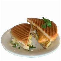 P5 Samosa Panini · Vegetable samosa topped with fresh tomatoes, lettuce, and green peppers, mint and garlic chu...