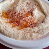 Hummus · Chickpeas mashed into paste with lemon juice and flavored with tahini.