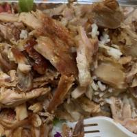Chicken Gyro · Layers of marinated chicken thighs wrapped around the large vertical split and grilled infro...