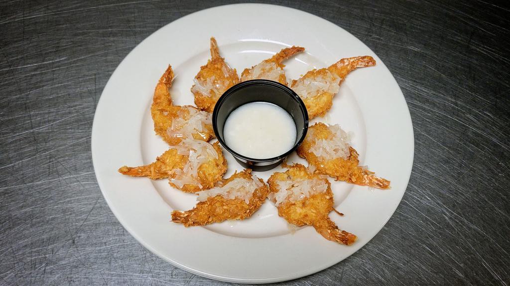 Coconut Shrimp · Served with our house-made coconut cream sauce.