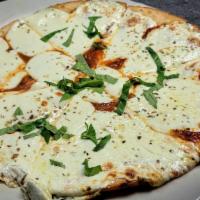 Margarita Pizza · Topped with mozzarella and fresh basil on a cauliflower crust.