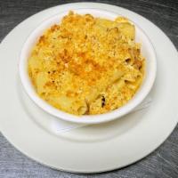 Pulled Pork Mac & Cheese · Our tender pork with pasta and cheese sauce. Topped with parmesan bread crumbs.