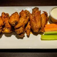 Wings Half Tray · This half tray is 5 servings of our crispy golden brown wings or our boneless, made in house...