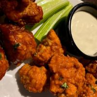 Boneless Wings · Breaded boneless wings made in house and  tossed in your choice of signature sauces: mild, m...