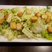 Caesar Salad · Romaine, sourdough croutons, Parmesan cheese, tossed in a classic Caesar dressing. Served wi...