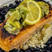 Avocado Salmon · Crispy seared salmon fillet topped with a creamy avocado salsa and served with cilantro infu...