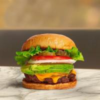 Avocado Club Burger · American beef patty topped with avocado, melted cheese, lettuce, tomato, onion, and pickles....