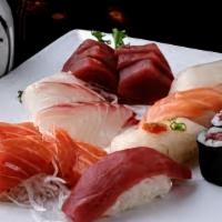 Sushi & Sashimi · 6 pcs assorted sashimi, 4 pcs assorted sushi, and a tuna roll.
