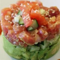 Spicy Tuna Tartar · Chopped tuna, avocado & sesame w. Sesame dressing - hot.